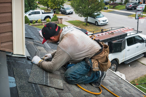Professional Roofing technician working in Lawn, PA